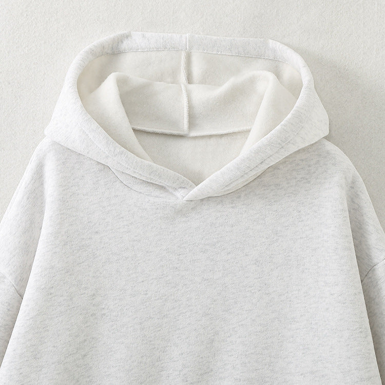 Damernas avslappnade hoodie med sidodelar Mirla-Eva Jonsson