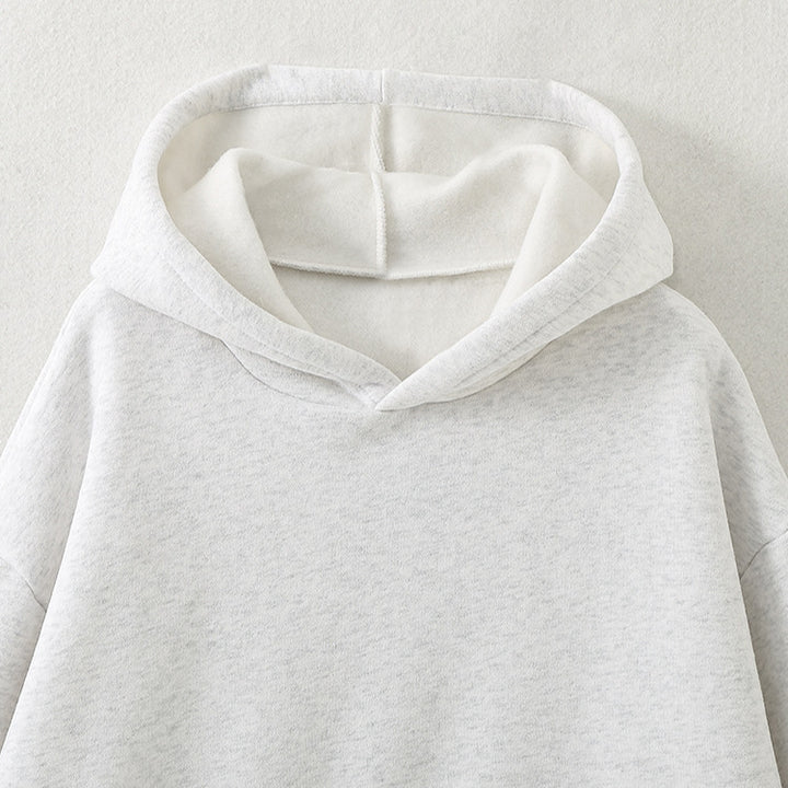 Damernas avslappnade hoodie med sidodelar Mirla-Eva Jonsson