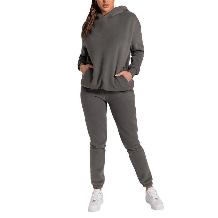 Damernas avslappnade hoodie-träningsdräkt med praktiska fickor och elastisk midja Mirla-Eva Jonsson