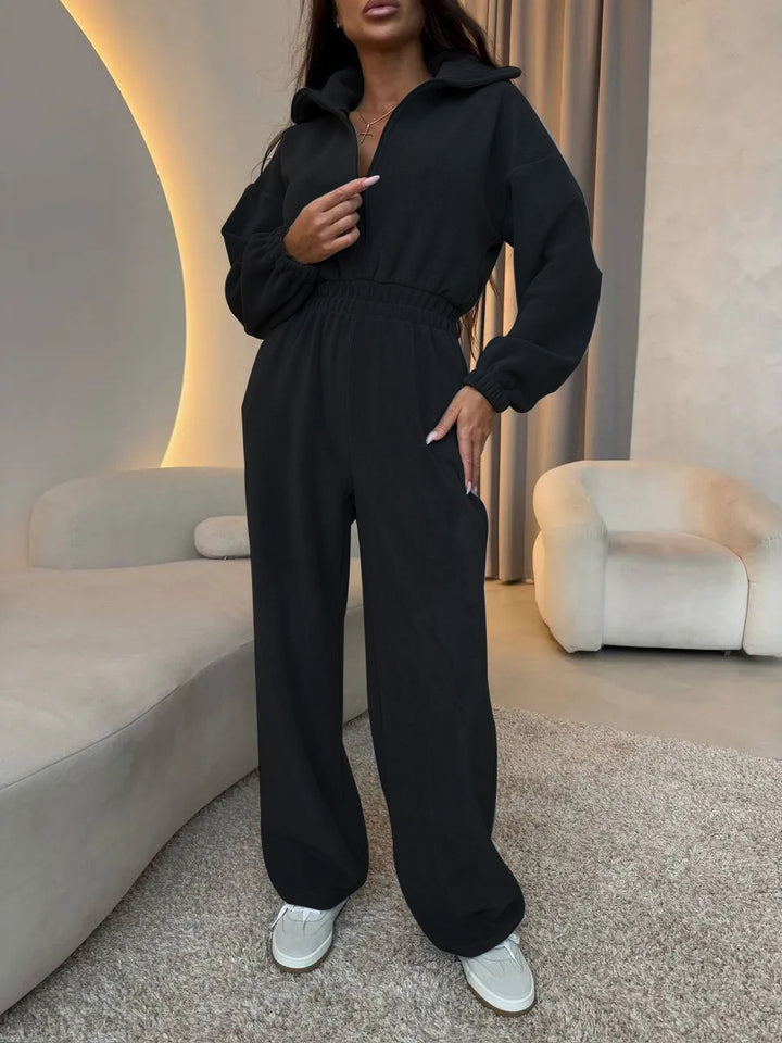 Damernas avslappnade jumpsuit med hög krage och justerbart midjeband Mirla-Eva Jonsson