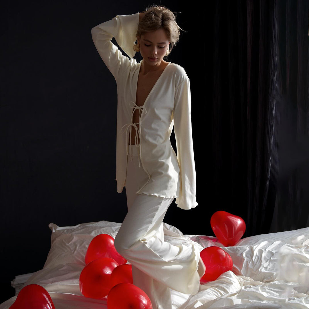 Damernas avslappnade jumpsuit med sidoknytning och breda ben Mirla-Eva Jonsson