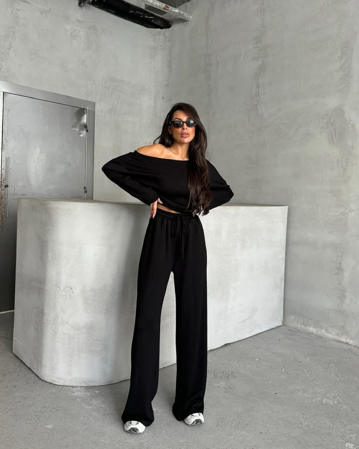 Damernas avslappnade jumpsuit med vida ben och off-shoulder design Mirla-Eva Jonsson