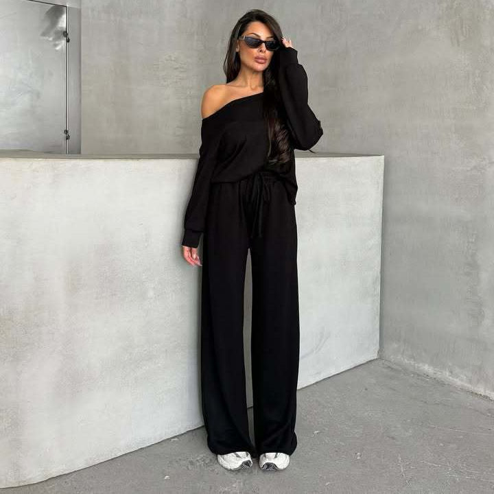 Damernas avslappnade jumpsuit med vida ben och off-shoulder design Mirla-Eva Jonsson