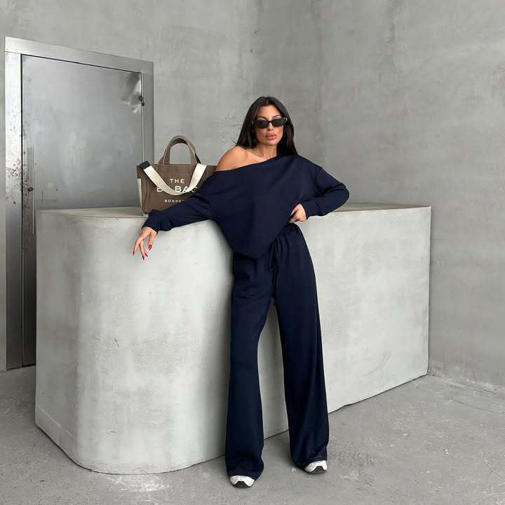Damernas avslappnade jumpsuit med vida ben och off-shoulder design Mirla-Eva Jonsson