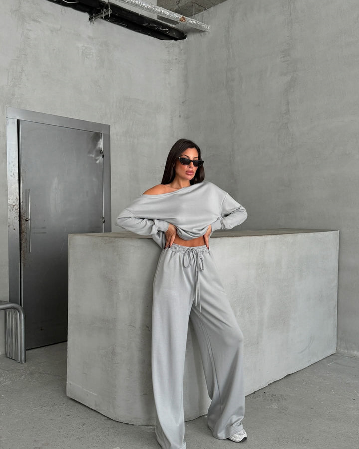 Damernas avslappnade jumpsuit med vida ben och off-shoulder design Mirla-Eva Jonsson