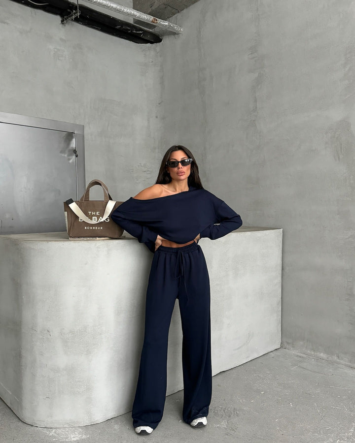 Damernas avslappnade jumpsuit med vida ben och off-shoulder design Mirla-Eva Jonsson