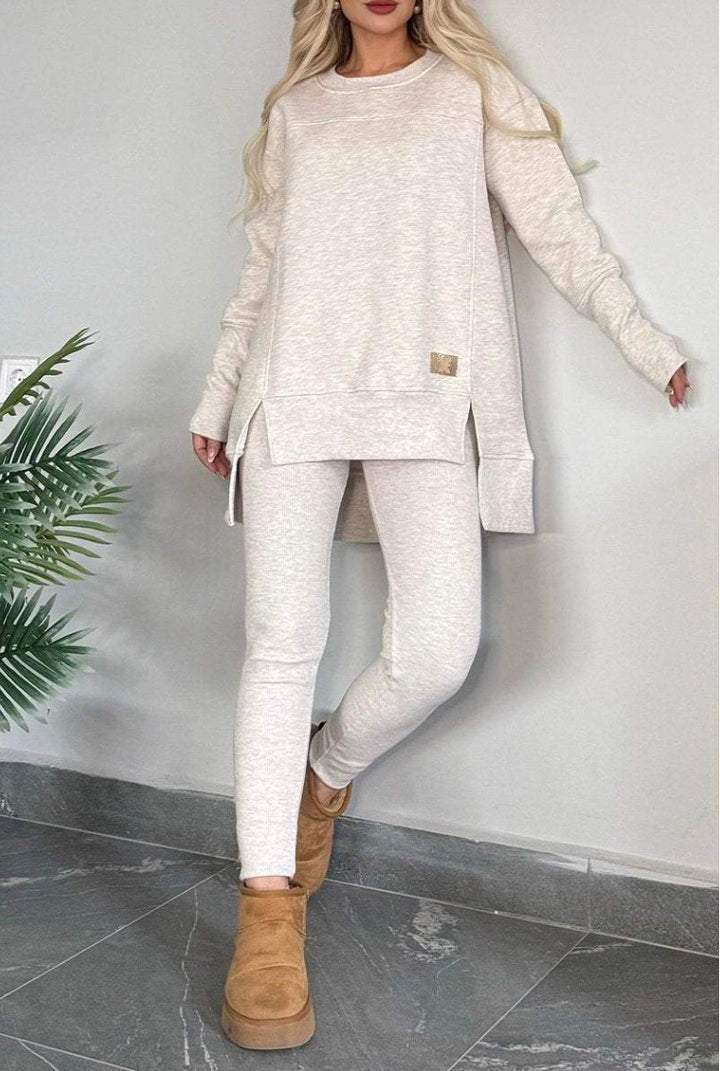 Damernas avslappnade långärmad sweatshirt-set med asymmetrisk skärning och praktiska fickor Eva Jonsson-Eva Jonsson