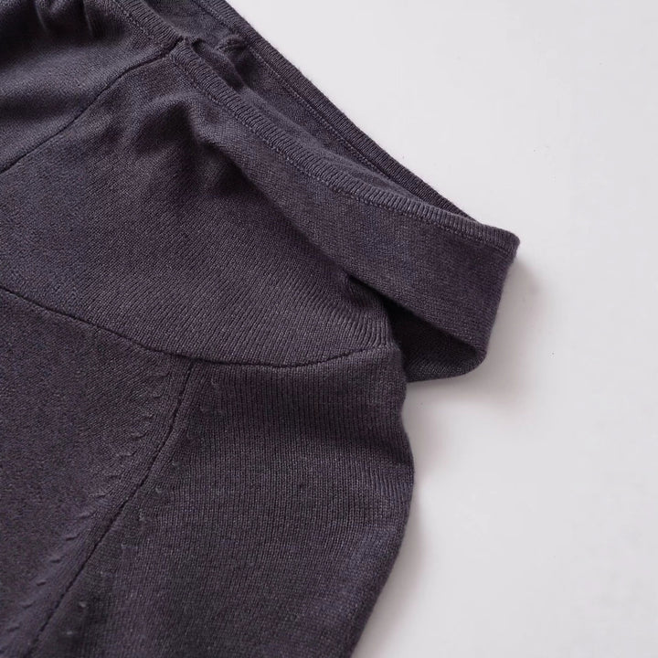 Damernas avslappnade långärmad topp med innovativa draperingar Mirla-Eva Jonsson