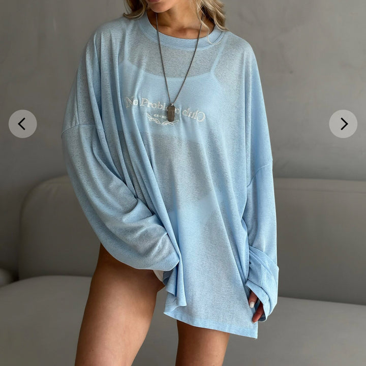 Damernas avslappnade långärmad tröja med lekfull knutdesign Mirla-Eva Jonsson