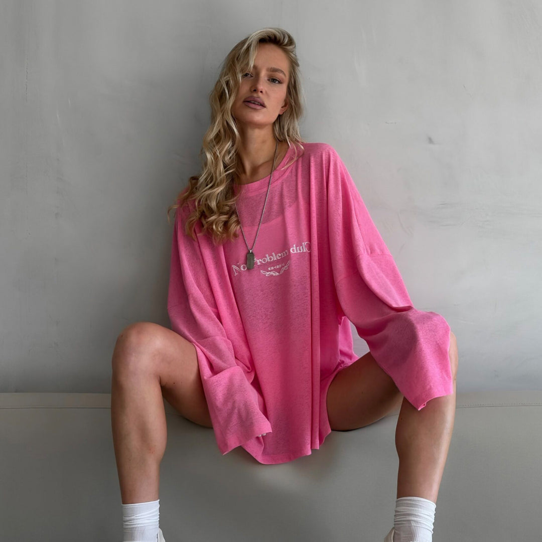 Damernas avslappnade långärmad tröja med lekfull knutdesign Mirla-Eva Jonsson