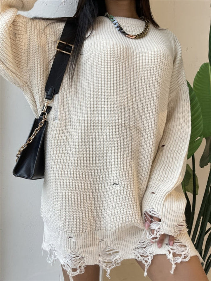 Damernas avslappnade långtröja med strukturerad ribbdesign och öppna sömmar Mirla-Eva Jonsson