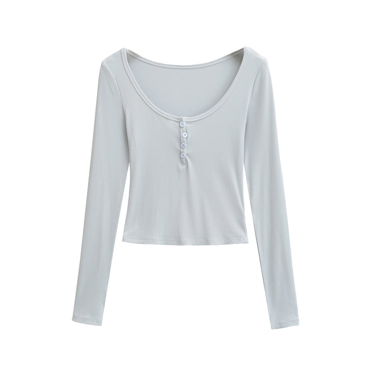 Damernas avslappnade longsleeve med knapplist och rundhals Mirla-Eva Jonsson