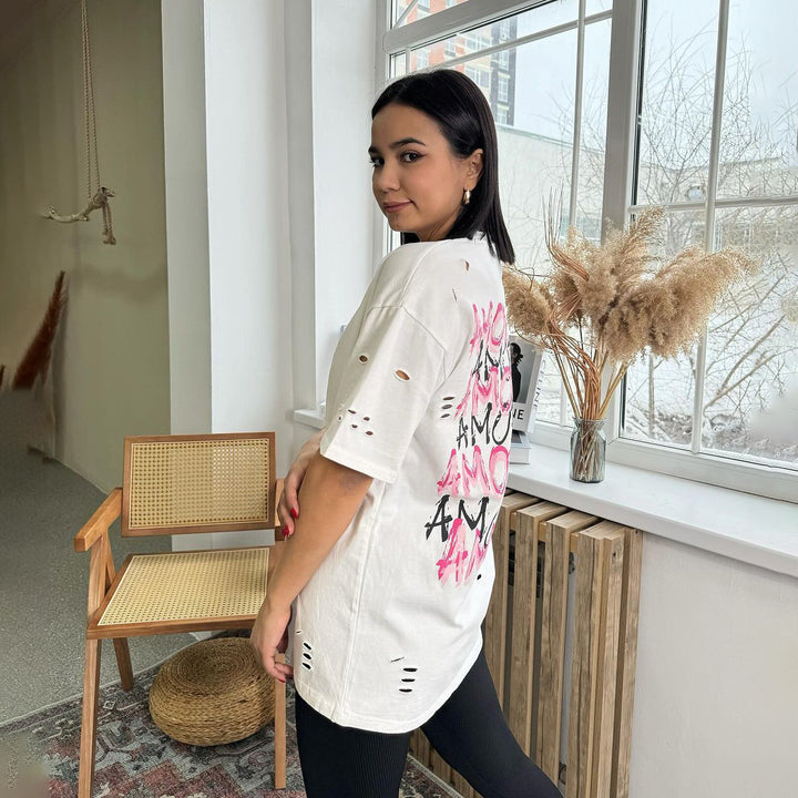 Damernas avslappnade oversized T-shirt med kreativ text Mirla-Eva Jonsson