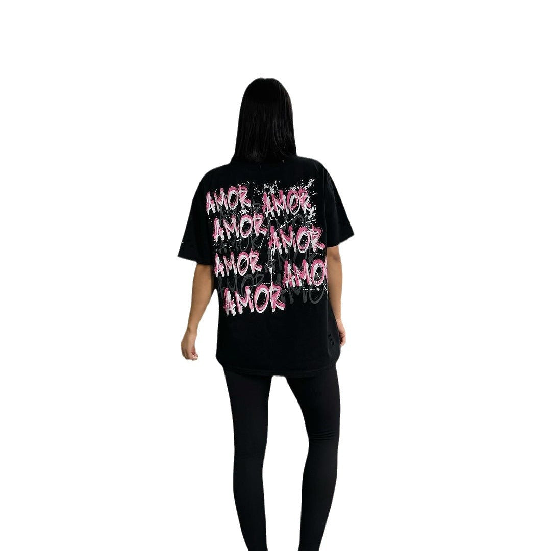 Damernas avslappnade oversized T-shirt med kreativ text Mirla-Eva Jonsson