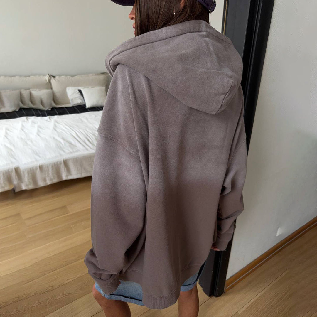 Damernas avslappnade oversized-jacka med hög krage och praktiska fickor Mirla-Eva Jonsson