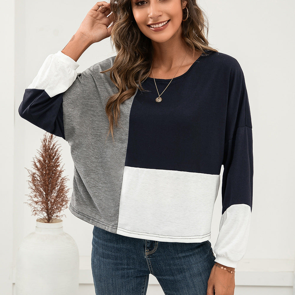 Damernas avslappnade oversized t-shirt med färgblockdesign och rundhalsflick Eva Jonsson-Eva Jonsson