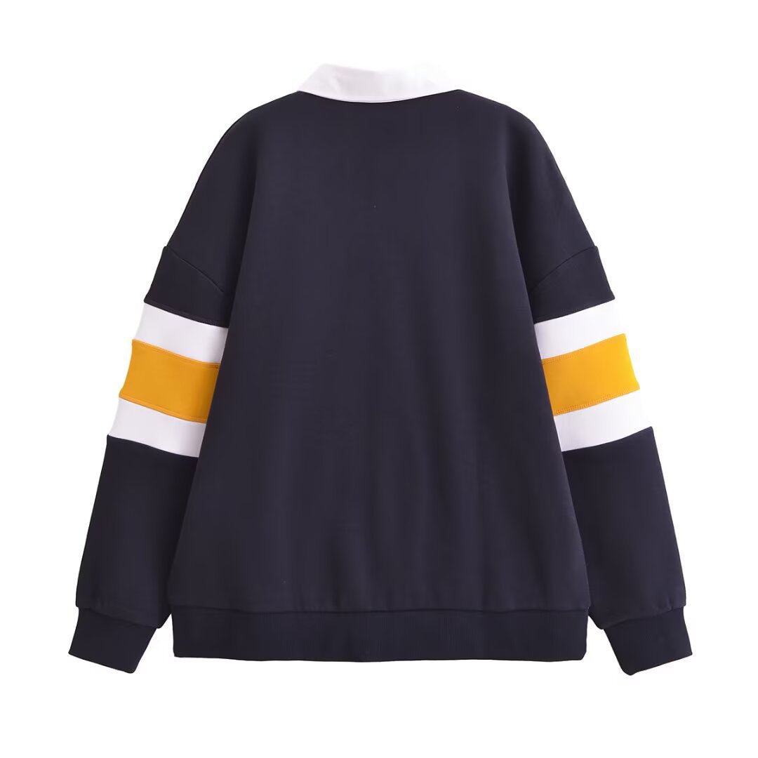 Damernas avslappnade polo tröja med färgblock-design Mirla-Eva Jonsson