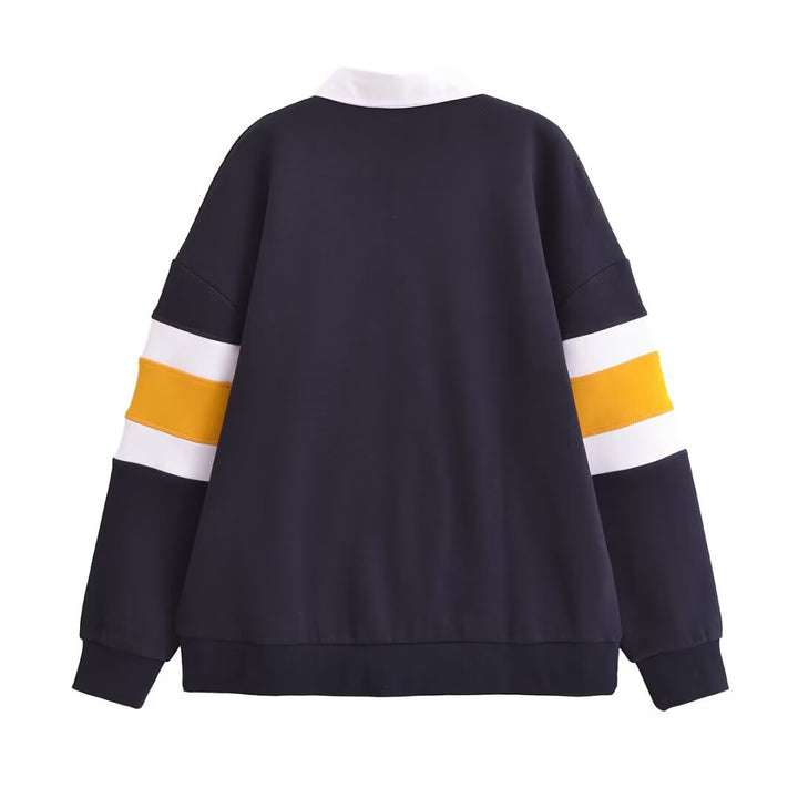 Damernas avslappnade polo tröja med färgblock-design Mirla-Eva Jonsson