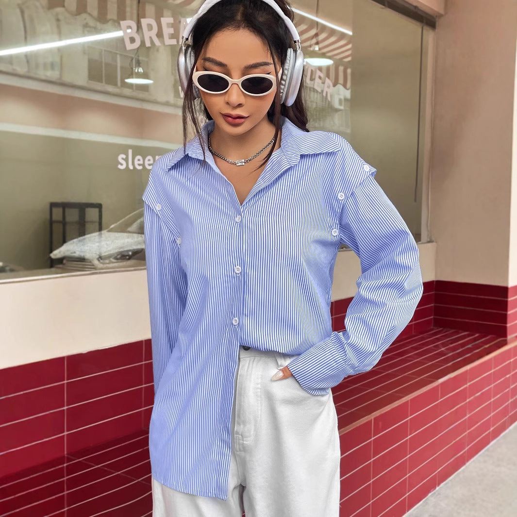 Damernas avslappnade randiga blus med oversized passform och knappar detaljer Mirla-Eva Jonsson
