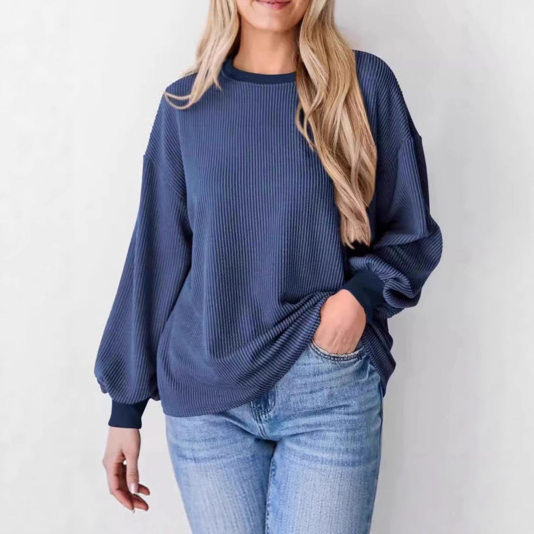 Damernas avslappnade ribbad tröja med vida ärmar Mirla-Eva Jonsson