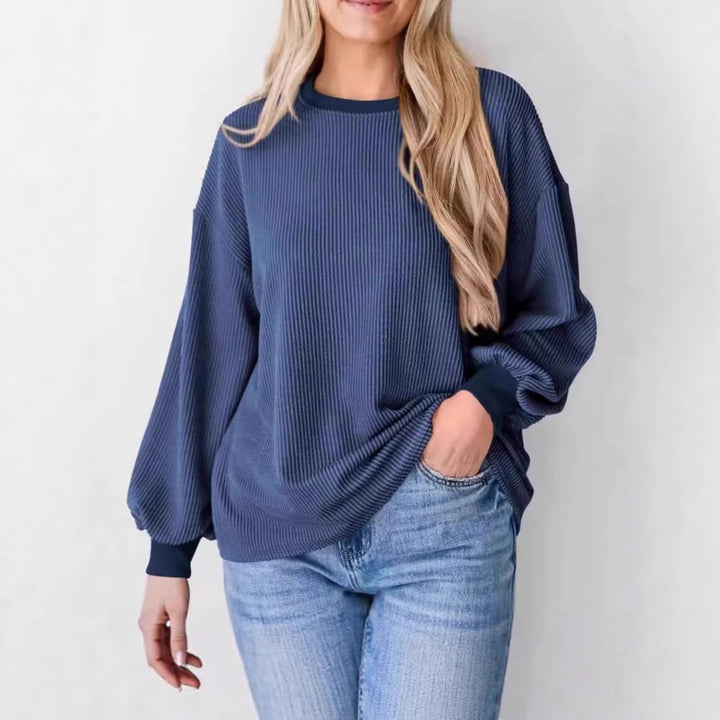Damernas avslappnade ribbad tröja med vida ärmar Mirla-Eva Jonsson