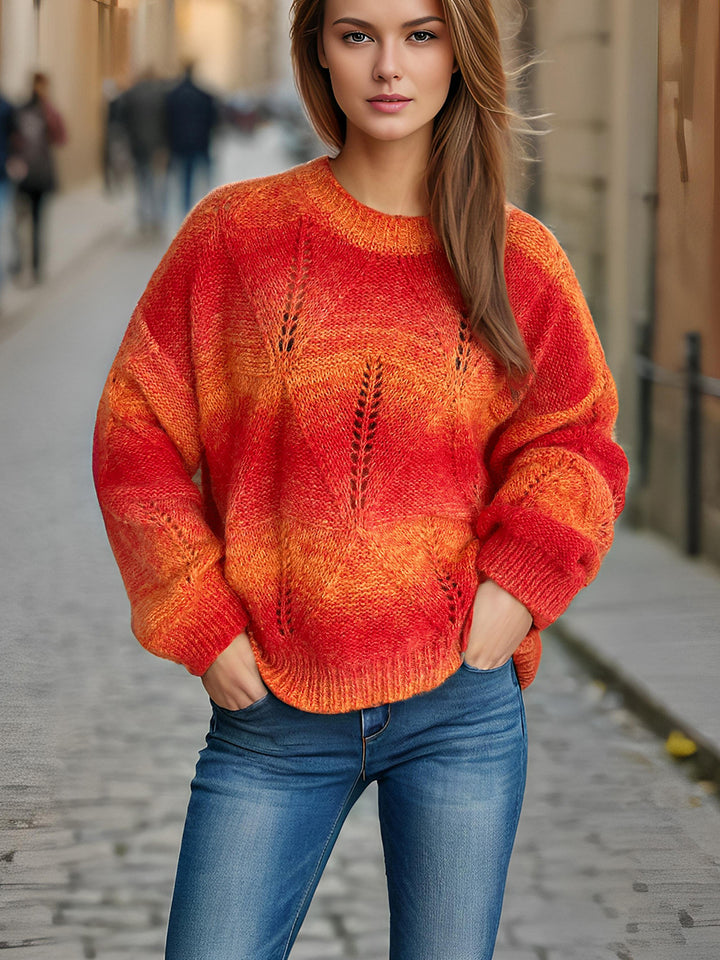 Damernas avslappnade stickad tröja med modernt hålmönster och voluminösa ärmar Eva Jonsson-Eva Jonsson