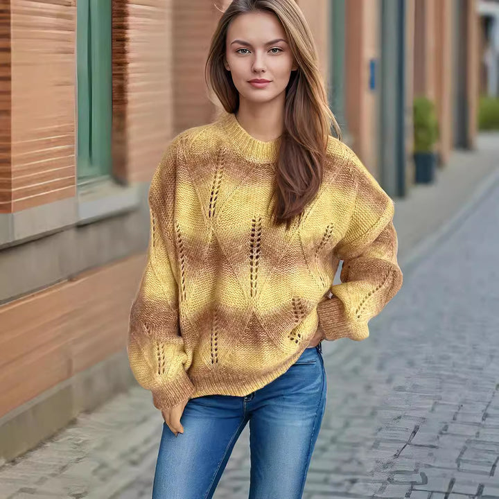 Damernas avslappnade stickad tröja med modernt hålmönster och voluminösa ärmar Eva Jonsson-Eva Jonsson