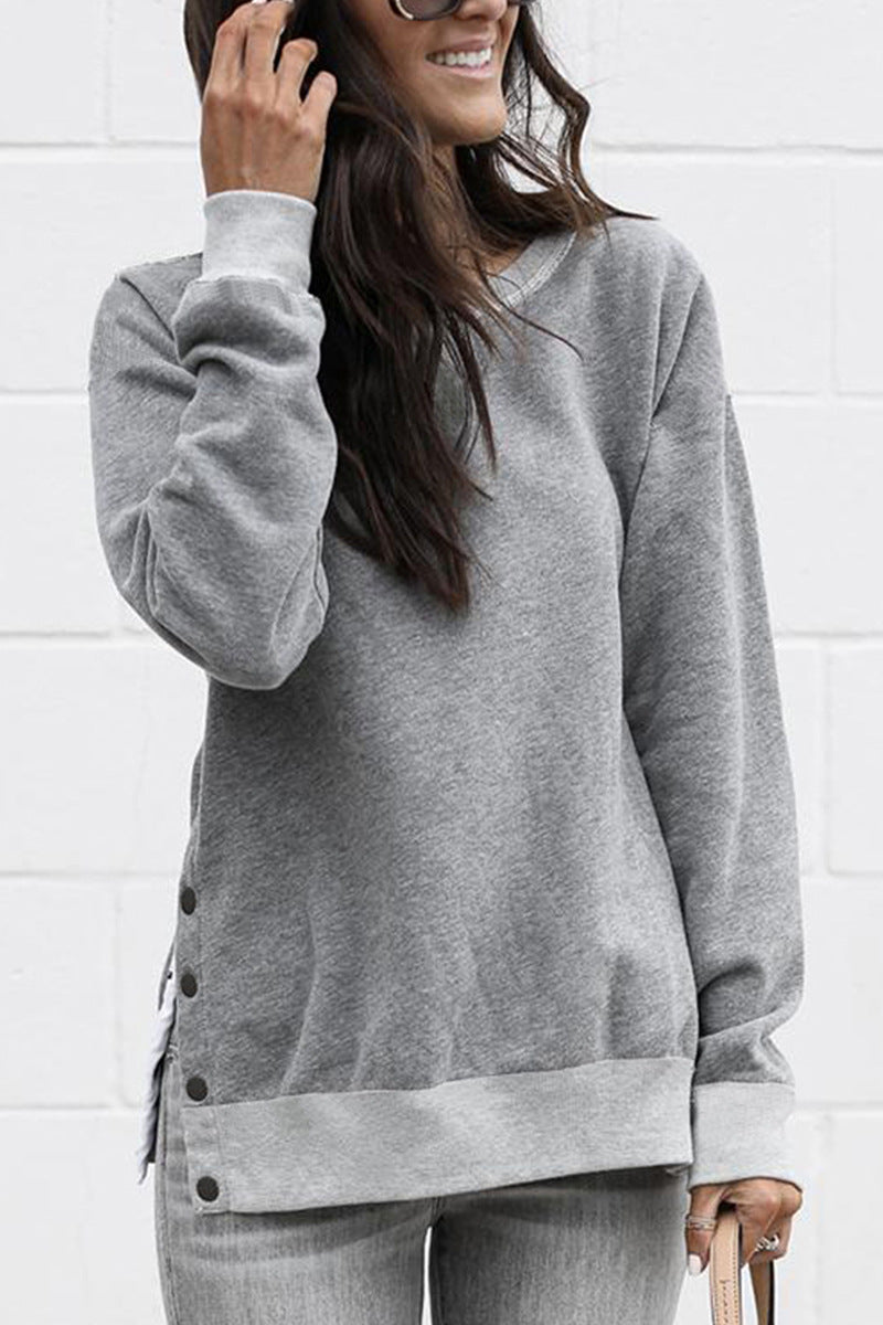 Damernas avslappnade sweatpullover med sidoknappar Mirla-Eva Jonsson