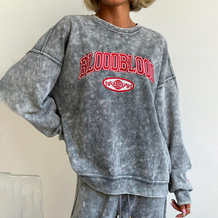Damernas avslappnade sweatshirt med kreativ text och mysig passform Mirla-Eva Jonsson