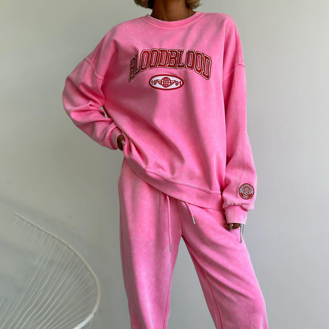 Damernas avslappnade sweatshirt med kreativ text och mysig passform Mirla-Eva Jonsson