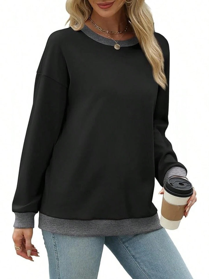 Damernas avslappnade sweatshirt med moderiktig kontrastlinning Mirla-Eva Jonsson
