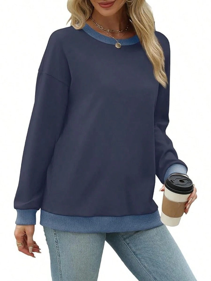 Damernas avslappnade sweatshirt med moderiktig kontrastlinning Mirla-Eva Jonsson