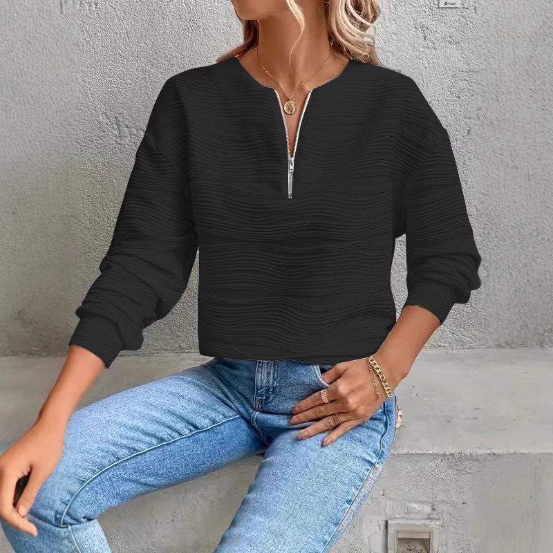 Damernas avslappnade sweatshirt med strukturerad design och dragkedja Mirla-Eva Jonsson