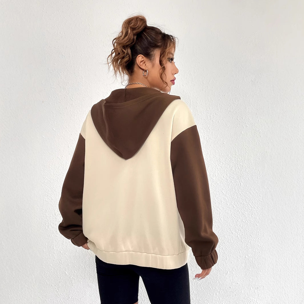 Damernas avslappnade sweatshirtjacka med kontrasterande ärmar och huva Mirla-Eva Jonsson