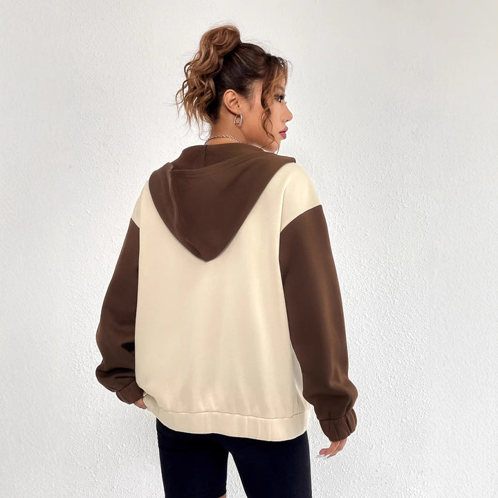 Damernas avslappnade sweatshirtjacka med kontrasterande ärmar och huva Mirla-Eva Jonsson