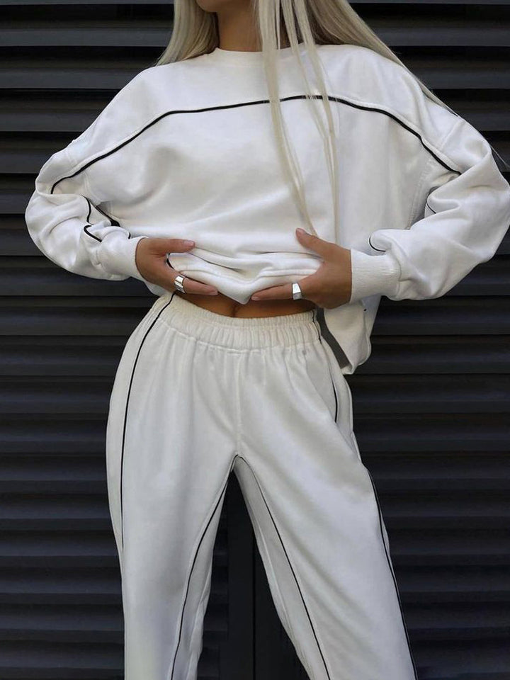 Damernas avslappnade träningsdräkt med cropped topp och lös passform Mirla-Eva Jonsson