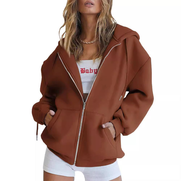 Damernas avslappnade zip-hoodie med rymlig huva och praktiska fickor Mirla-Eva Jonsson