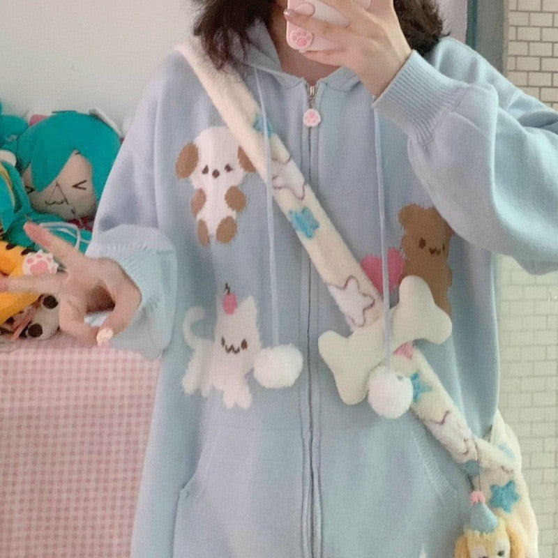 Damernas bekväma hoodie med lekfulla djurmotiv Mirla-Eva Jonsson