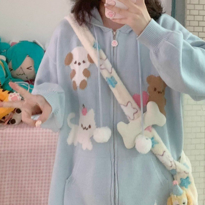 Damernas bekväma hoodie med lekfulla djurmotiv Mirla-Eva Jonsson