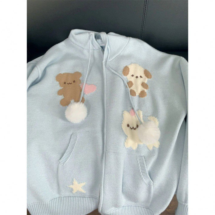 Damernas bekväma hoodie med lekfulla djurmotiv Mirla-Eva Jonsson