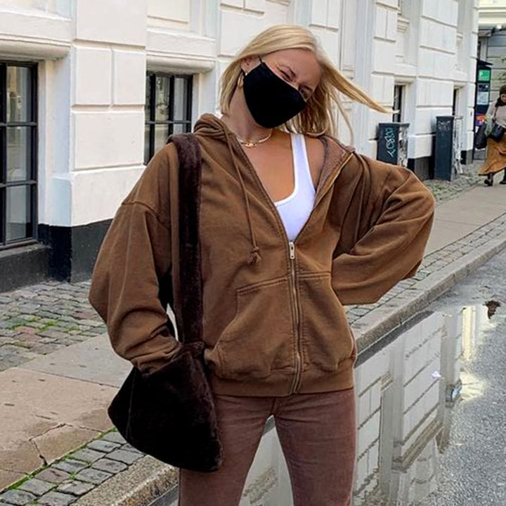 Damernas bekväma huvtröja med dragkedja och känguruficka Mirla-Eva Jonsson