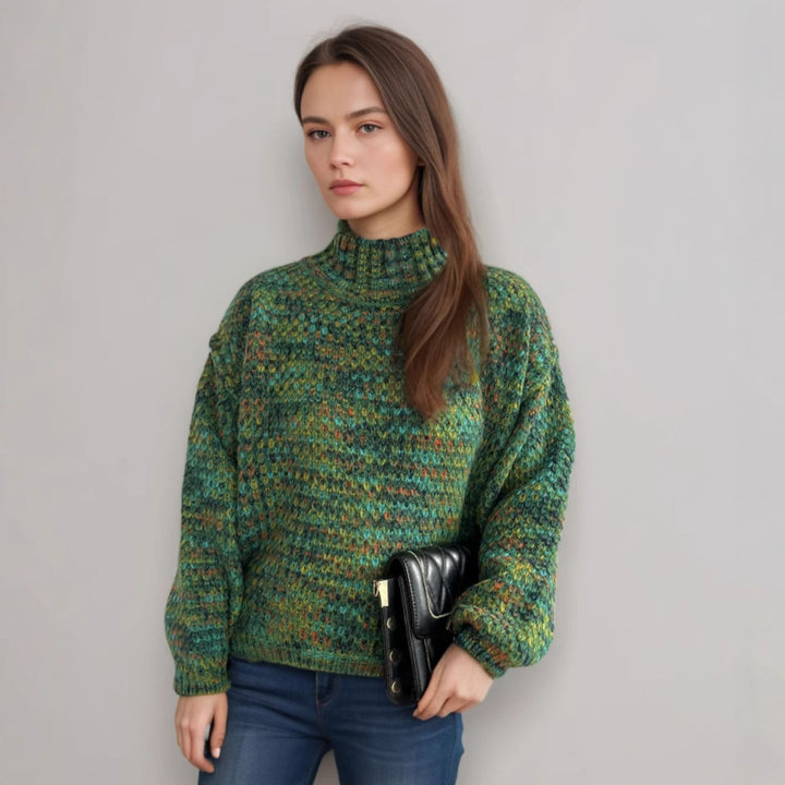 Damernas bekväma rullkragepullover med modern öppet stickdesign Mirla-Eva Jonsson