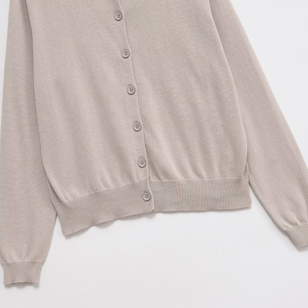 Damernas bekväma stickad cardigan med knapppdetaljer Mirla-Eva Jonsson