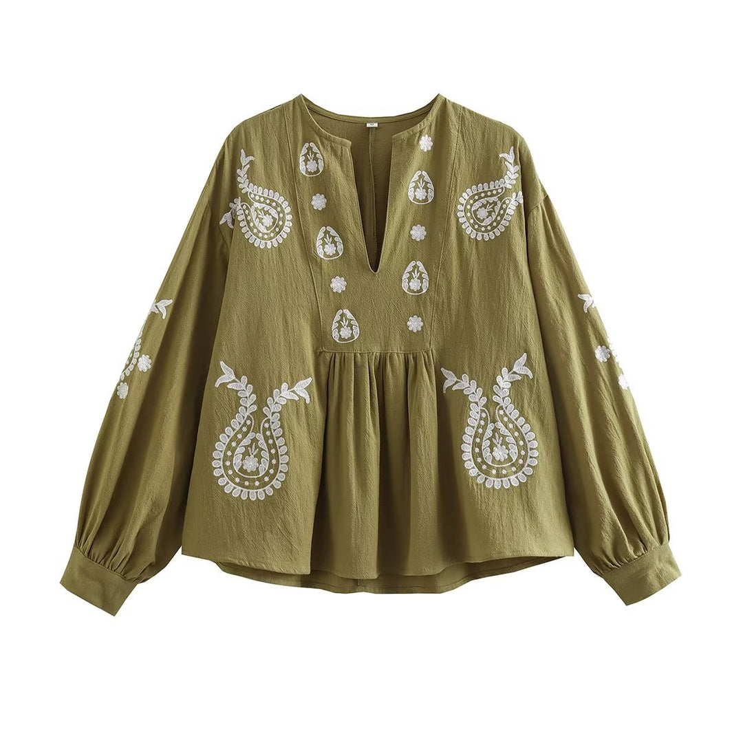 Damernas broderad blus med ballongärmar och V-ringning Mirla-Eva Jonsson