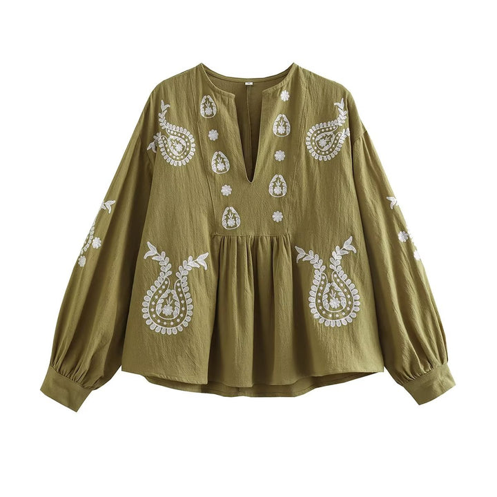 Damernas broderad blus med ballongärmar och V-ringning Mirla-Eva Jonsson