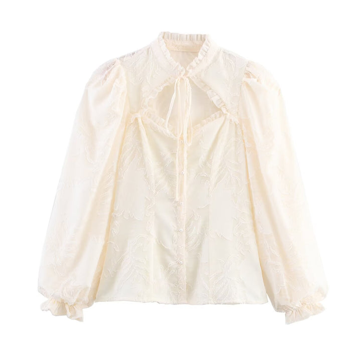 Damernas broderad blus med puffärmar och lekfulla detaljer Mirla-Eva Jonsson
