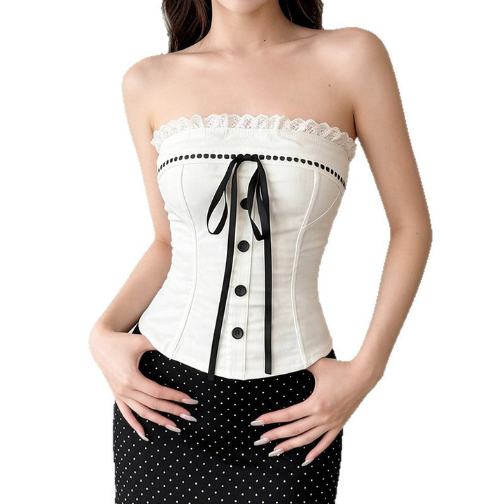 Damernas bustier-top med dekorativ volangkant och knappdetaljer Mirla-Eva Jonsson