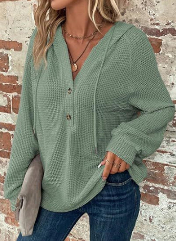 Damernas casual hoodie med knappdetaljer och strukturerad väv Eva Jonsson-Eva Jonsson