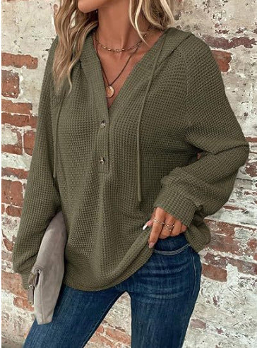 Damernas casual hoodie med knappdetaljer och strukturerad väv Eva Jonsson-Eva Jonsson