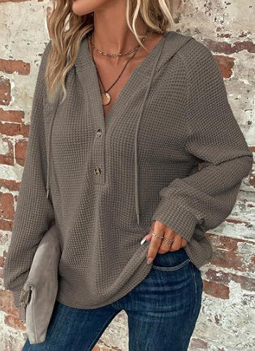 Damernas casual hoodie med knappdetaljer och strukturerad väv Eva Jonsson-Eva Jonsson